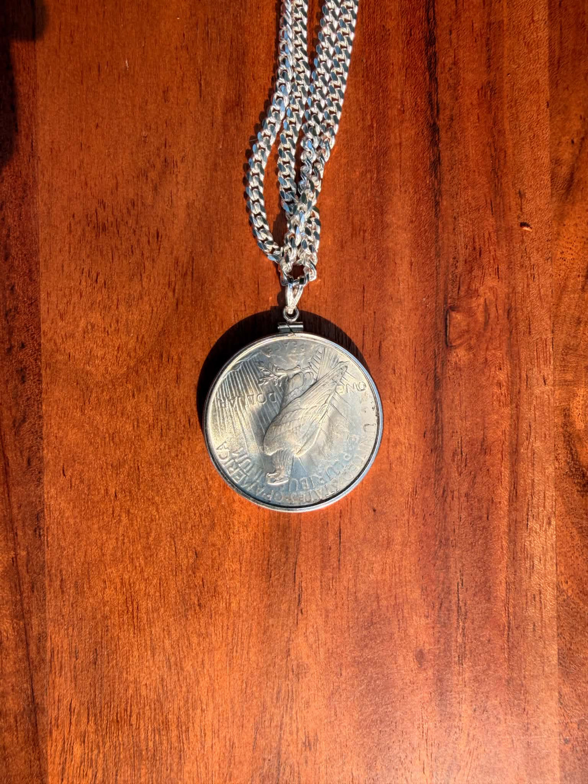 1923 Peace dollar pendant, eagle side close-up