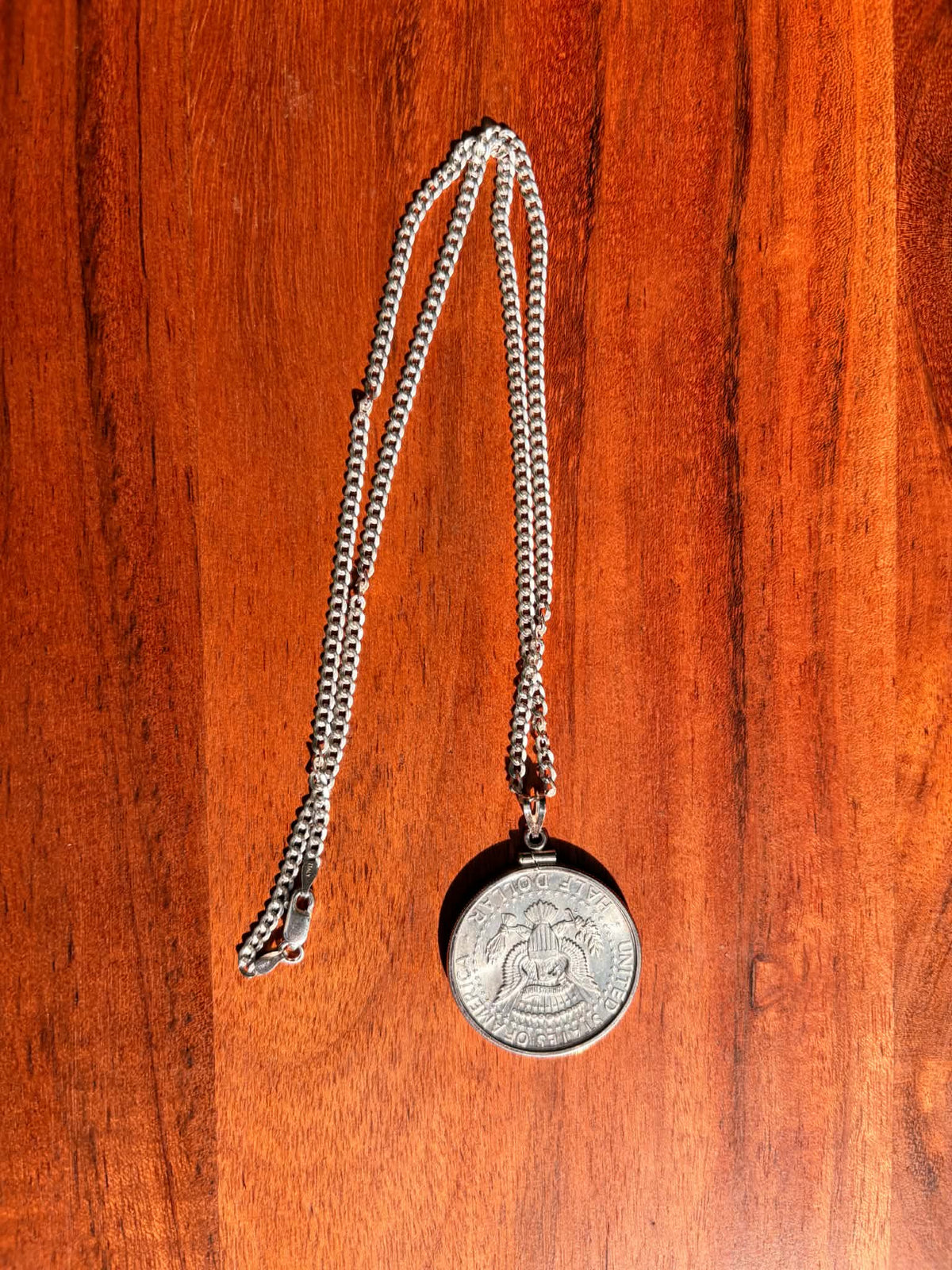 Kennedy half-dollar pendant necklace, eagle side