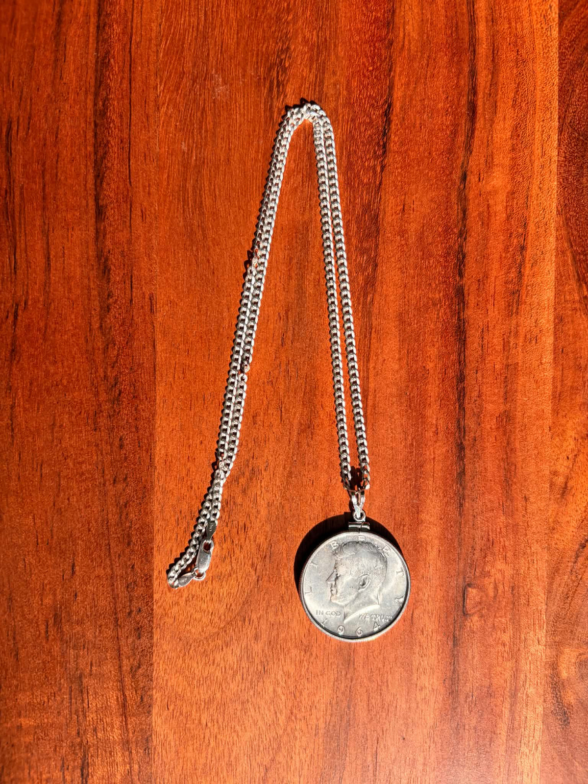 Kennedy half-dollar pendant necklace, portrait side